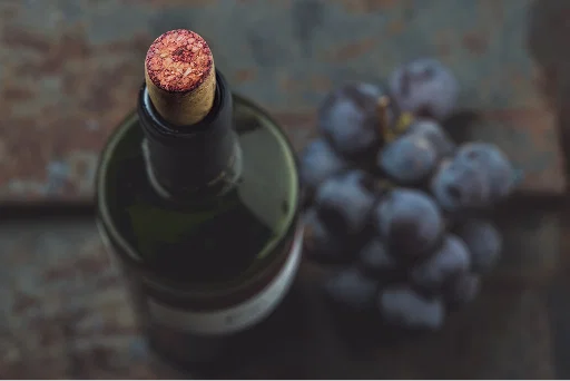 Wine bottle, grapevine