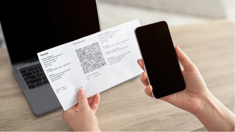 Scan the QR code on the invoice